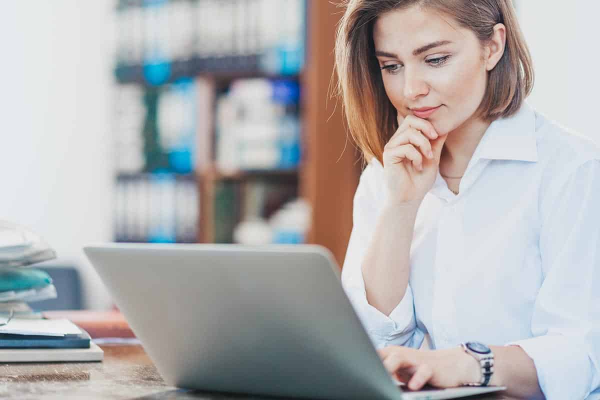 Female employee completing digital onboarding process from home