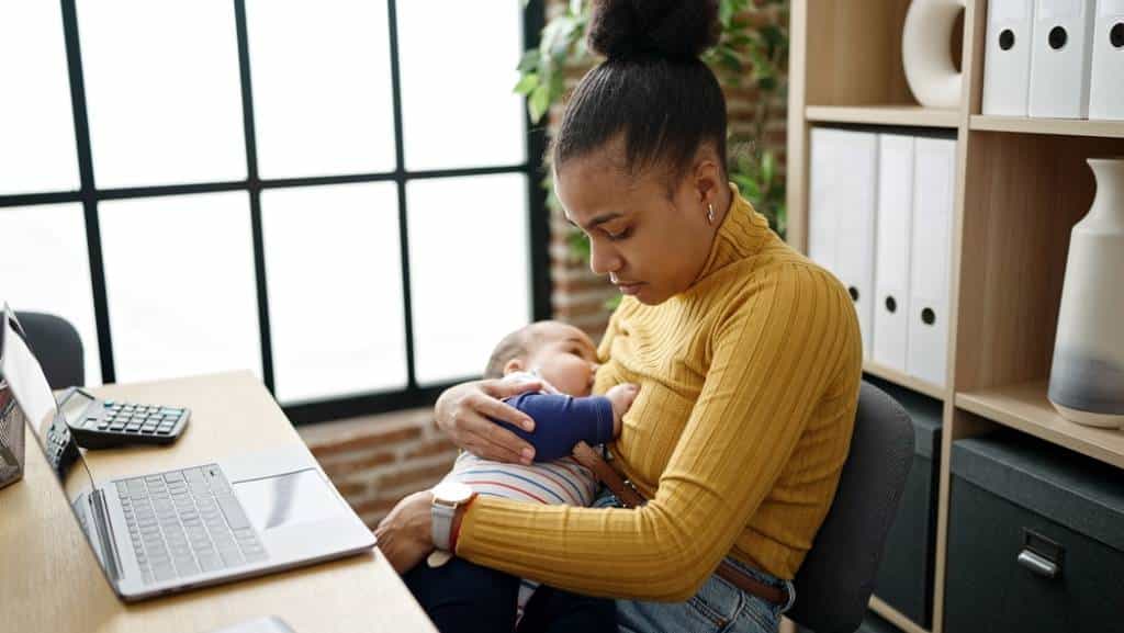 Woman in a private office with her newborn.